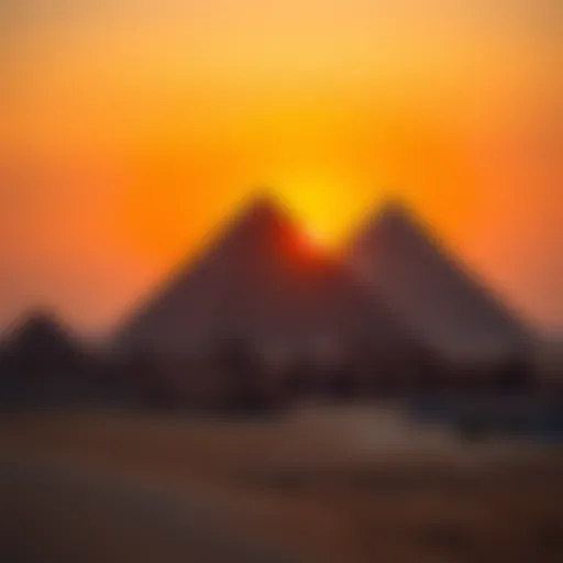 Ancient Egyptian pyramids standing majestically against the sunset sky