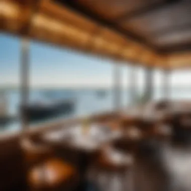 Elegant dining setup inside Fish Box restaurant with a view of the water