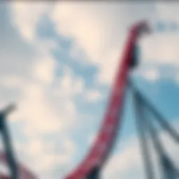 A breathtaking view of a roller coaster soaring high against the sky