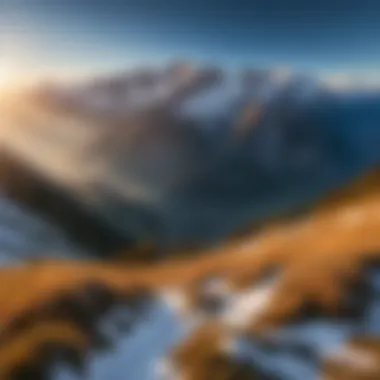 A panoramic view of the majestic Alps at sunrise, showcasing snow-capped peaks and glistening valleys.